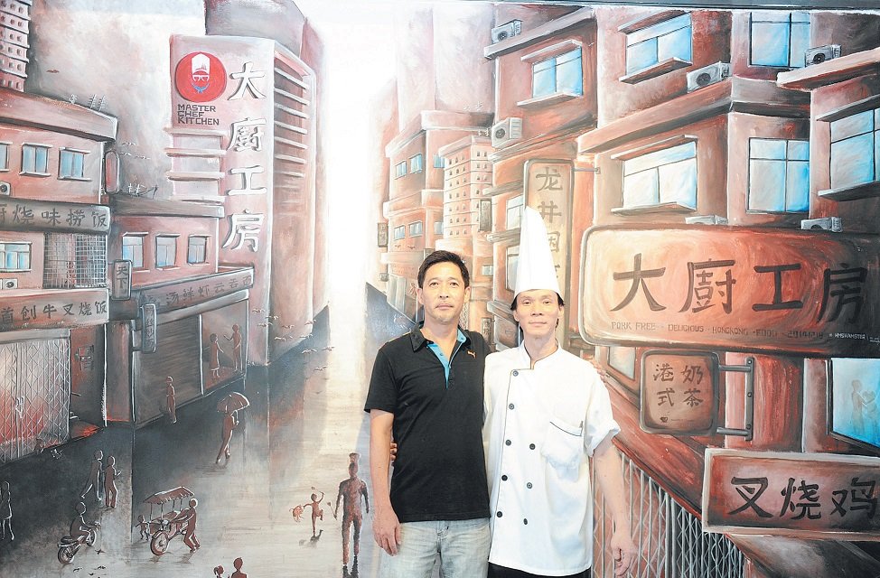 大厨工房的老板之一张荣良（左）及香港主厨陈辉。