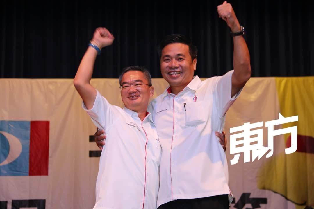 甲州行动党领军人物，州秘书邱培栋（左）及主席郑国球（右）。