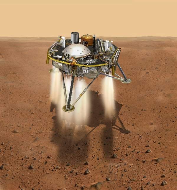 “洞察号”落到火星表面的模拟图。
