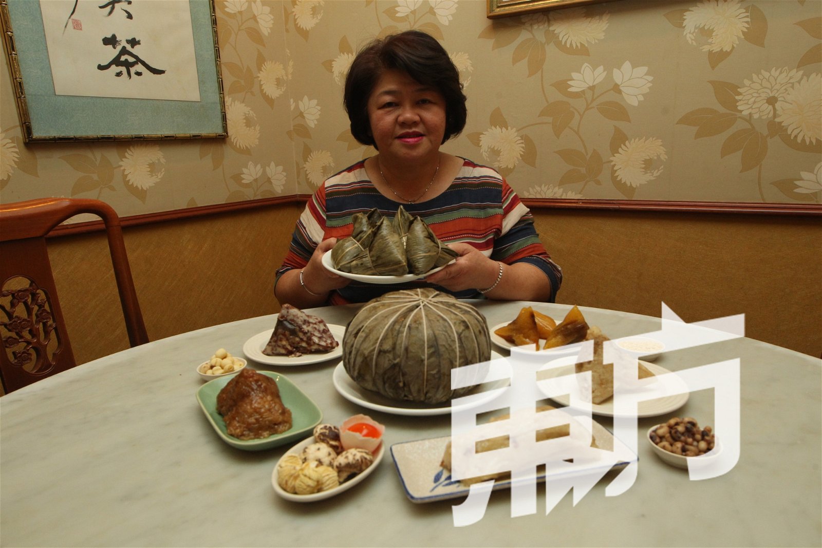 陈慧仪说，自己对粽子有一种莫名的情感，即便对著粽子已超过27年，但她至今仍很喜欢裹粽子的满足感。