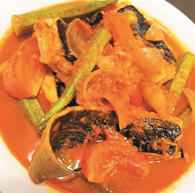 顾客使用“阿春酱好料”烹煮魔鬼鱼，并拍下卖相可口的美食照片分享。