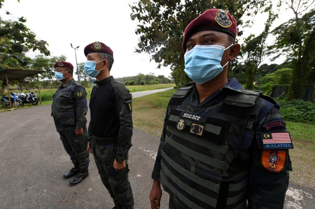 普通行动部队巡警在马泰边境站岗，维护边境治安稳定。