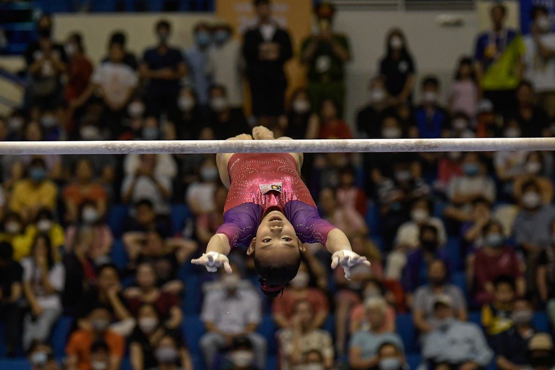 大马选手杨丽雯在女子高低杠个人赛中，力压越南与新加坡选手，为大马收获第15枚金牌.（图取自马新社）