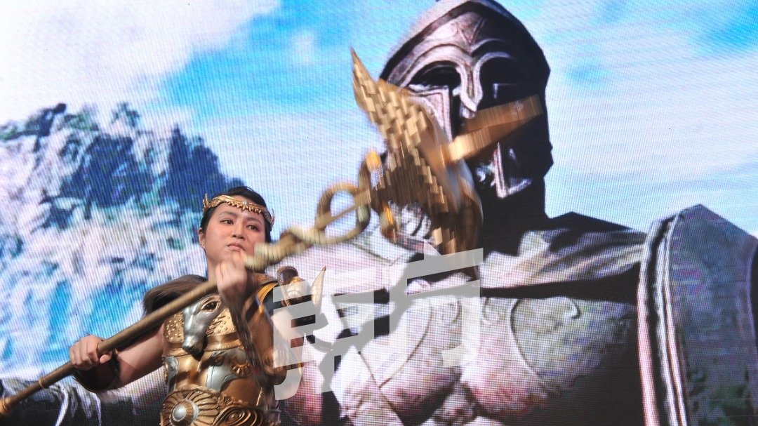 《东方日报》编辑部行政执行员黄毅璇扮演《刺客信条：奥德赛》（Assassin's Creed Odyssey）中的天神宙斯之女卡珊德拉（Kassandra），服装和表情惊艳全场。