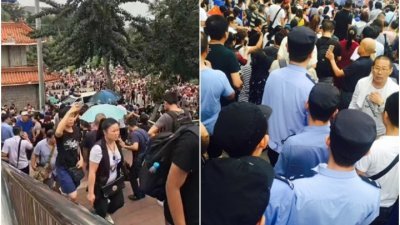 自各地的数万名“善心汇”会员打著横幅，高喊口号在北京举行大规模请愿活动。
