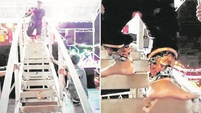 新加坡“第一届国际包公文化展”中，乩童赤脚登上刀梯，令围观者捏一把冷汗。