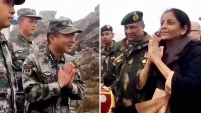 印度国防部长西塔拉曼在锡金段乃堆拉山口，与中国解放军士兵交流，她用“合十礼”问候，解放军官员也双手合十并对西塔拉曼说“你好”。