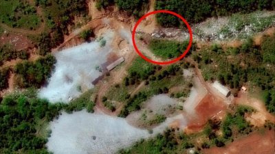 DigitalGlobe提供的最新卫星图像显示，可观察核试验场西面坑道爆破的瞭望台（红圈）已经建成。朝鲜预计在周四下午举行丰溪里核试验场关闭仪式。