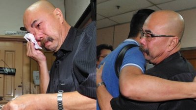 一名华文报记者上前拥抱叶一德给予他安慰。（摄影：杨金森）