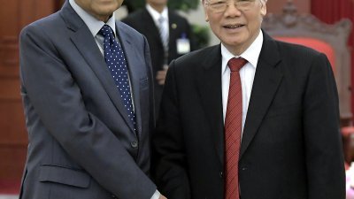 马哈迪（左）拜会越南国家主席阮富仲。