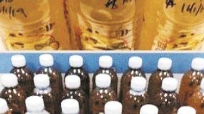 警方在肃毒行动中，所充公的40瓶毒饮料。