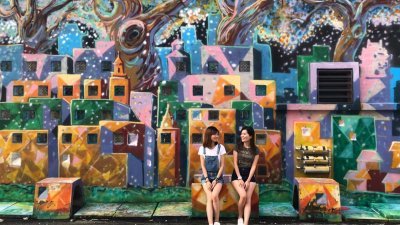 怡保新街场的壁画成为许多游客的打卡旅游胜地。