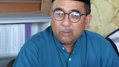 丹绒比艾国席泛马伊斯兰阵线候选人拿督峇德鲁希山。