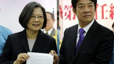 代表民进党参加2020年台湾总统选举的蔡英文（左），及其参选搭档赖清德，周二前往台湾中选会登记。（图取自中新社）