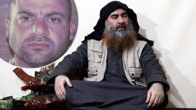 恐怖组织“伊斯兰国”（IS）头目巴格达迪据报在生前，已经指定卡达什（小图）为他的接班人。
