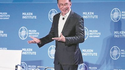 安华周四在新加坡出席米尔肯研究所亚洲峰会。