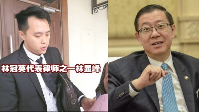 林显峰（左）在庭外向媒体解释案件审讯展延的原因。