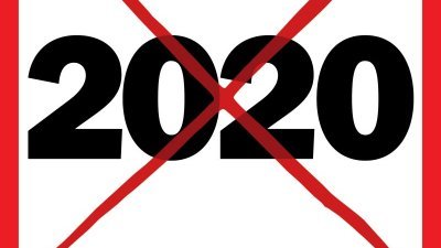美国《时代》杂志最新一期杂志封面显示，白底黑字的“2020”被画上一个大大的红叉，作为一段挣扎期的结束。

