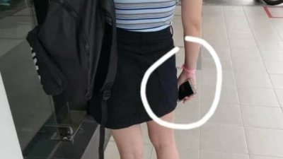 一名华裔女子被网民拍照，指她疑戴著隔离手环出外。