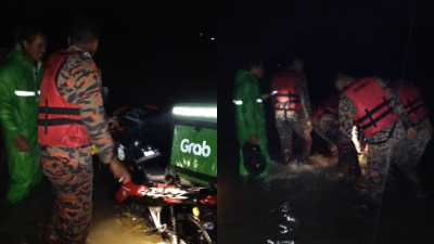 消拯员涉水1公里，才把受困者救出灾区。