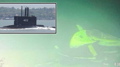 印尼国军25日宣布已找到失联系潜水艇的残骸，图为海底拍摄的潜舰船身。（图取自中央社）