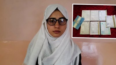 阿富汗大学入学考试上周放榜，20岁的巴兰荣膺女状元，令她欣喜若狂，不过也开始担心塔利班掌权后的未来。小图为巴兰考取佳绩的证书。（图取自路透社）