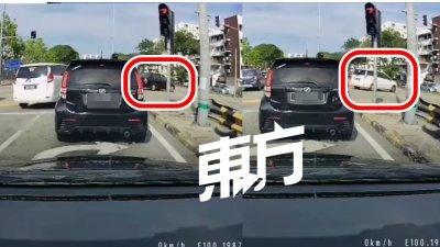 视频清晰拍摄2辆插队闯红灯汽车的车牌号码。