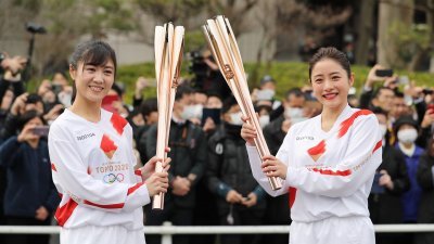 东京奥运会圣火传递在即，但日本地方政府皆投诉目前没有接到有关当局明朗化的防疫标准作业程序（SOP）。（档案照）