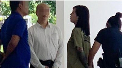 林紫虹（左3）曾被老公诬陷，导致她被警方逮捕。（档案照）