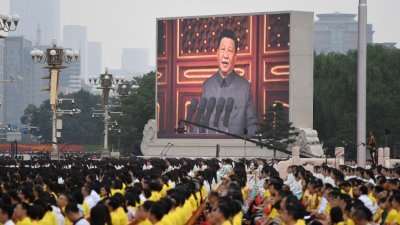 中共总书记习近平在中共建党100周年庆祝大会上发表讲话。（图取自法新社）