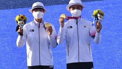 代表韩国队出战的金济德和安山成功为韩国摘下本届奥运的首金。（图取自路透社）