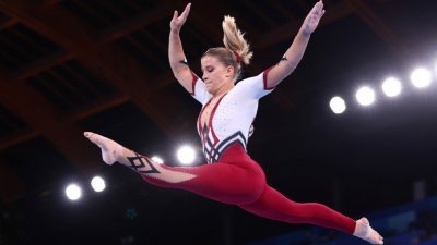 德国女子体操队代表在周日的资格赛中，穿的一件式体操服不仅覆盖大腿，还一路延伸到脚踝。（图取自路透社）