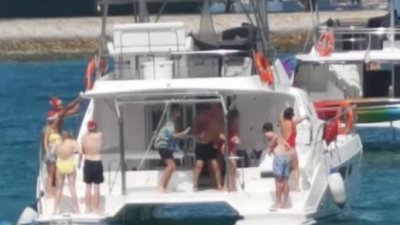 10名男女在私人游艇上聚会狂欢，因违反聚会限制，各被判罚款3000新元（约9000令吉）。