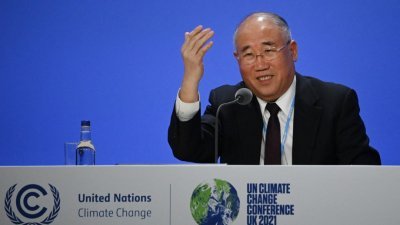 中国气候变化事务特使解振华当地时间周三，在联合国气候变化大会的记者会上，就中美联合声明发表讲话。-法新社-