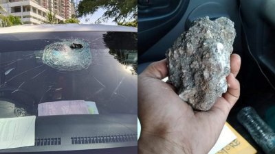 一辆货车在高速公路行驶，疑被路旁顽童丢石头，砸中挡风镜。