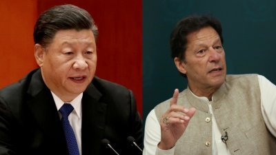 中国国家主席习近平（左）告诉巴基斯坦总理伊姆兰汗，中巴两国互为最可信赖的铁杆兄弟。-路透社-