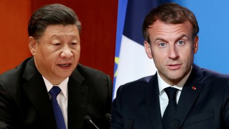 中国国家主席习近平（左）和法国总统马克龙通电时表示，中方高度重视发展中法关系。（图取自路透社）