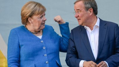 德国总理默克尔（左）当地时间周六，同拉舍特出席北莱茵-威斯特法伦州（北威州）亚琛的竞选集会。(图取自法新社)