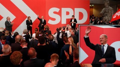 社民党党魁兼总理候选人肖尔茨，周日晚在电视上播出了估计数字后，在该党位于柏林的总部挥手致意。（法新社）