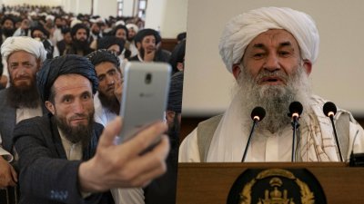 阿富汗塔利班政权总理阿洪德上周六在喀布尔前总统府举行的集会上讲话，期间有一名塔利班成员拿著他的智慧手机拍照。（图取自法新社）
