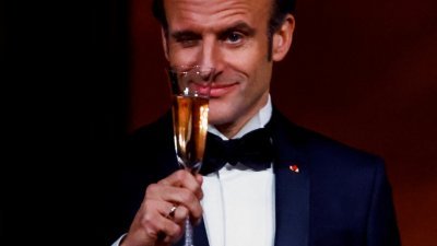 法国总统马克龙日前访美，出席总统拜登为款待他而设的国宴。（路透社）