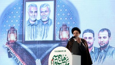 伊朗总统莱希于周一在首都德黑兰，举行纪念高级军事指挥官苏莱曼尼被杀两周年的仪式上讲话。（图取自WANA/路透社）
