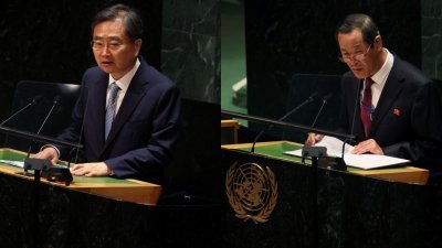 韩国常驻联合国代表赵显（左）和朝鲜常驻联合国代表金星，周三在联合国大会唇枪舌剑。（图取自路透社）