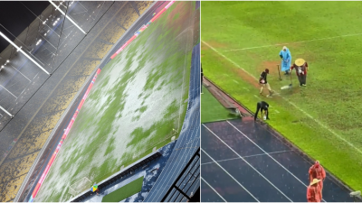 武吉加里尔国家体育场昨晚遭遇滂沱大雨，导致球场草皮严重积水。右图为工作人员使用人力方式清除积水的场景。（图取自网络）
