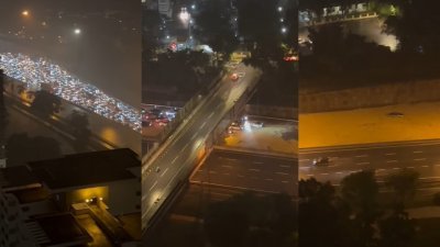 名为“Calvin Hew”的网民也从高楼拍摄了莎阿南大道车道被积水淹没的30秒短视频。
