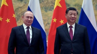 俄罗斯总统普京今年2月4日到北京出席冬奥开幕式期间，会晤中国国家主席习近平。（俄罗斯卫星通讯社/克里姆林宫/路透社档案照）