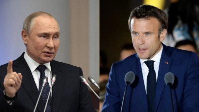 俄罗斯总统普京（左）和法国总统马克龙当地时间周二，再次就乌克兰局势通电话。（图取自俄罗斯卫星通讯社/法新社）