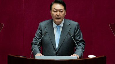 韩国总统尹锡悦周一在国会，发表他上周上任后的首份施政演说。（图取自路透社）
