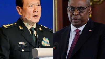 到柬埔寨出席东盟防长会议的中国国防部长魏凤和（左）及美国国防部长奥斯汀，据报在周二会晤。（图取自路透社）