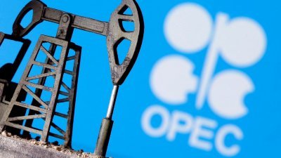 插图显示OPEC标志前一个3D打印的油泵千斤顶。（图取自路透社档案照）